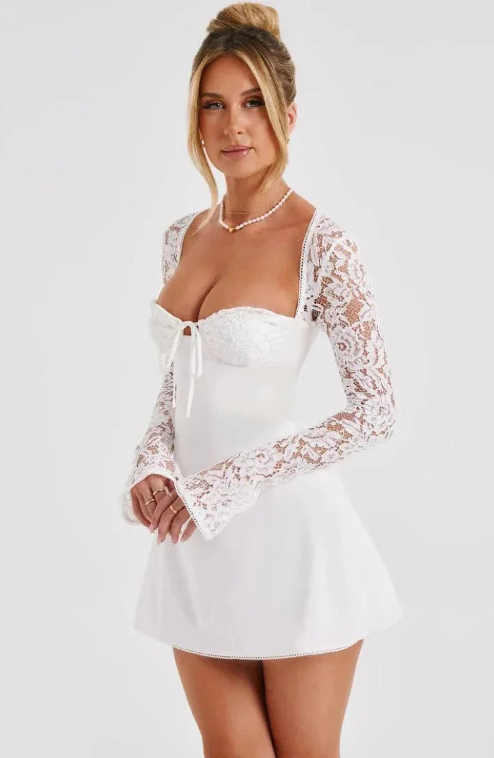 "Layni long sleeve lace mini dress with bow, a charming pick for a sophisticated look."
