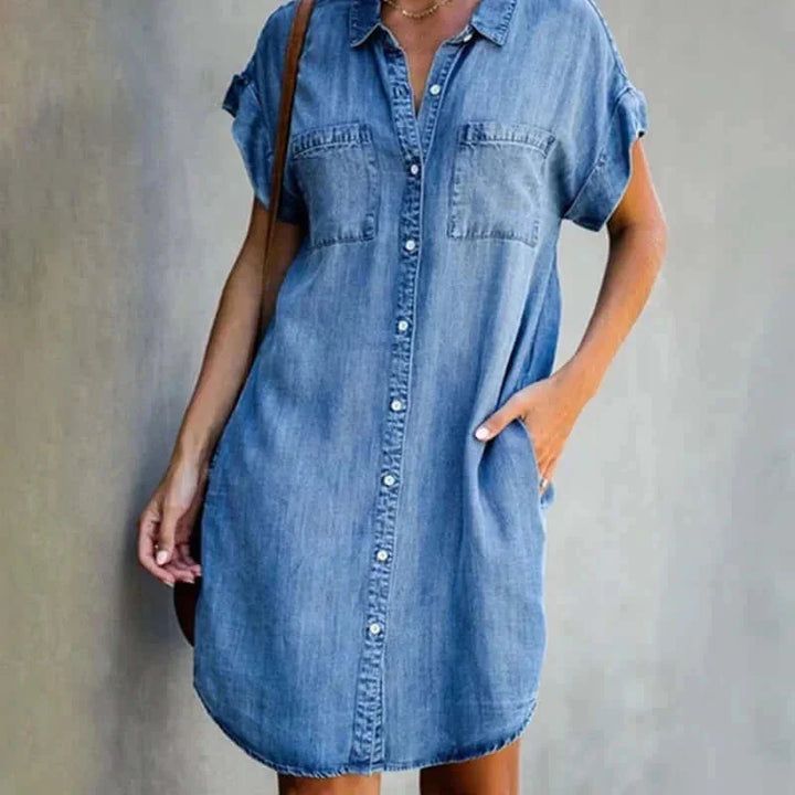 Light blue denim shirt dress with a relaxed fit, perfect for casual outings. Made of comfortable and durable denim fabric…